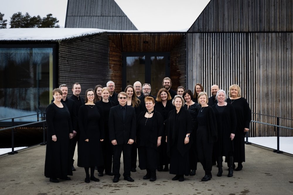 Collegium Vocale foran en bygning